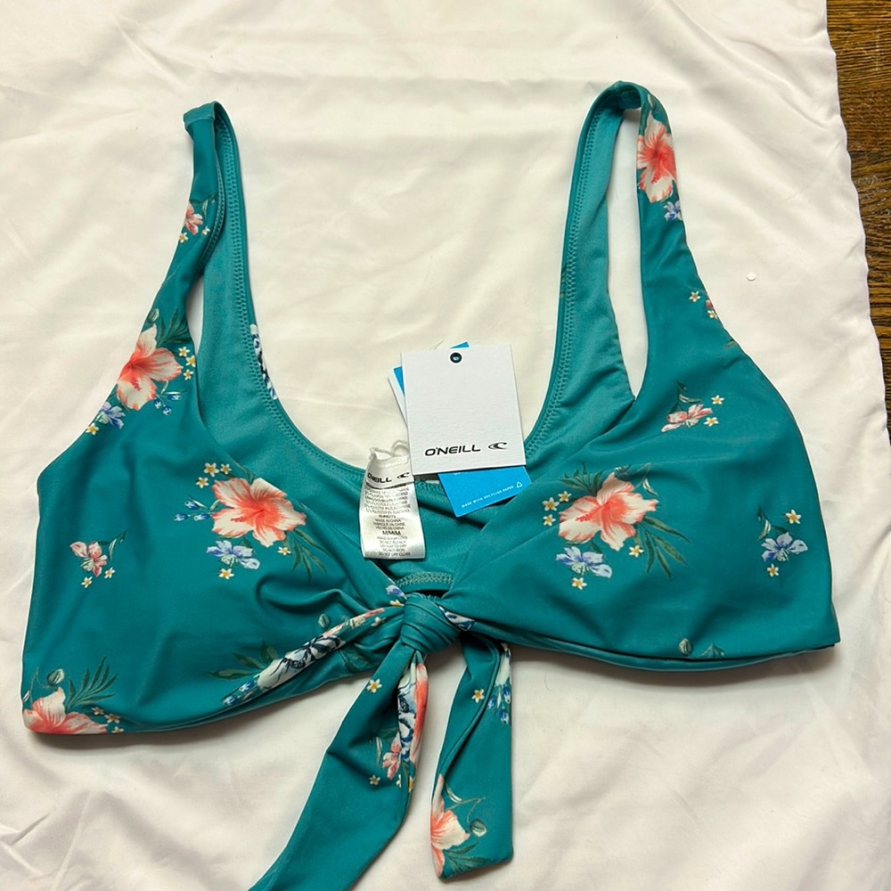 O’Neill teal floral bikini top, size M, brand new, tags still on